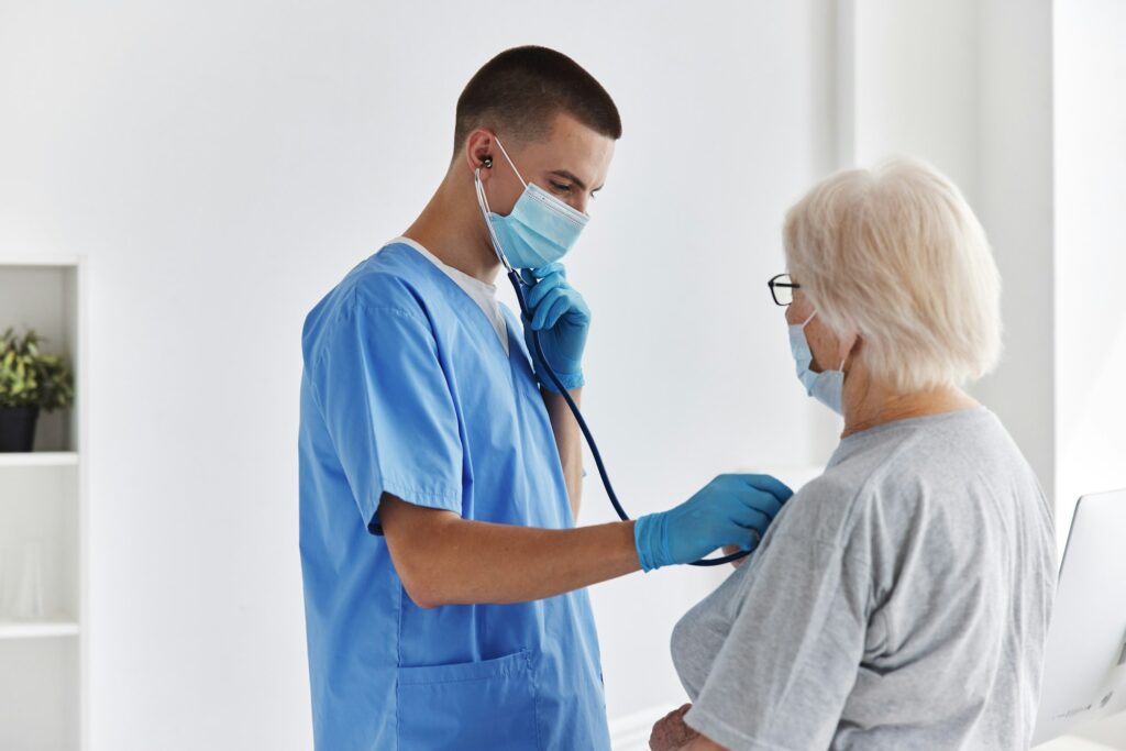 elderly woman vaccine passport health care